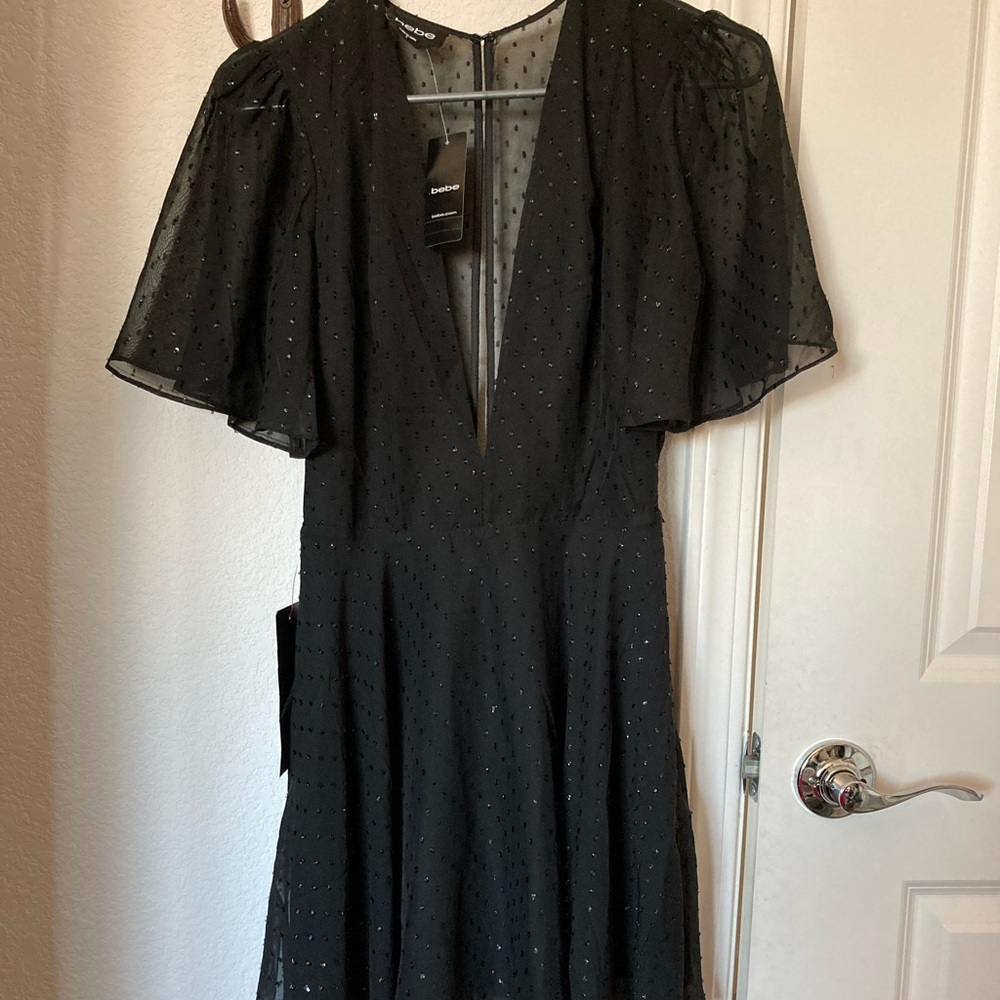 Black mid-length flowy dress, BeBe size 2, Plunging V-Neck